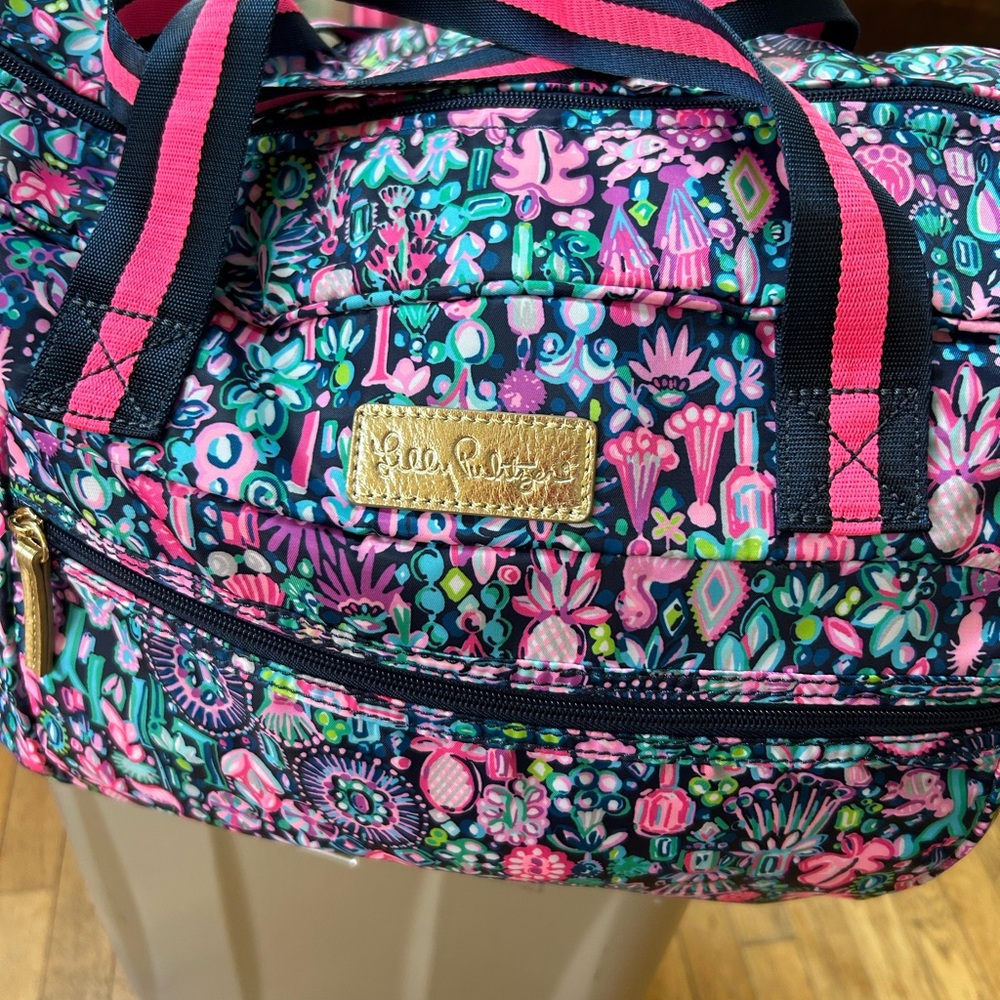 Lilly Pulitzer overnight travel weekender bag.